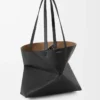 Medium horizontal Puzzle Fold tote in soft grained calfskin Black