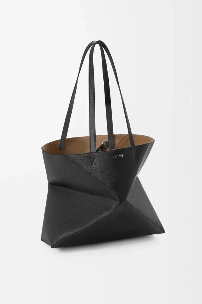 Medium horizontal Puzzle Fold tote in soft grained calfskin Black