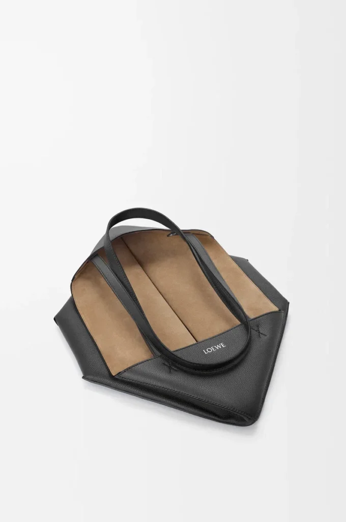 Medium horizontal Puzzle Fold tote in soft grained calfskin Black