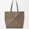Medium horizontal Puzzle Fold tote in soft grained calfskin Taupe