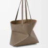 Medium horizontal Puzzle Fold tote in soft grained calfskin Taupe