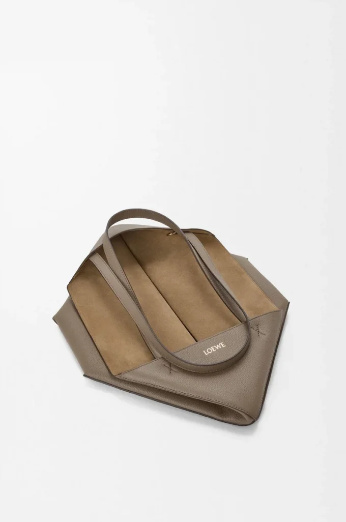 Medium horizontal Puzzle Fold tote in soft grained calfskin Taupe