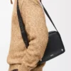 Medium Pebble messenger bag in smooth calfskin Black