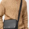 Medium Pebble messenger bag in smooth calfskin Black