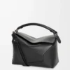 Medium Puzzle Edge bag in classic calfskin Black