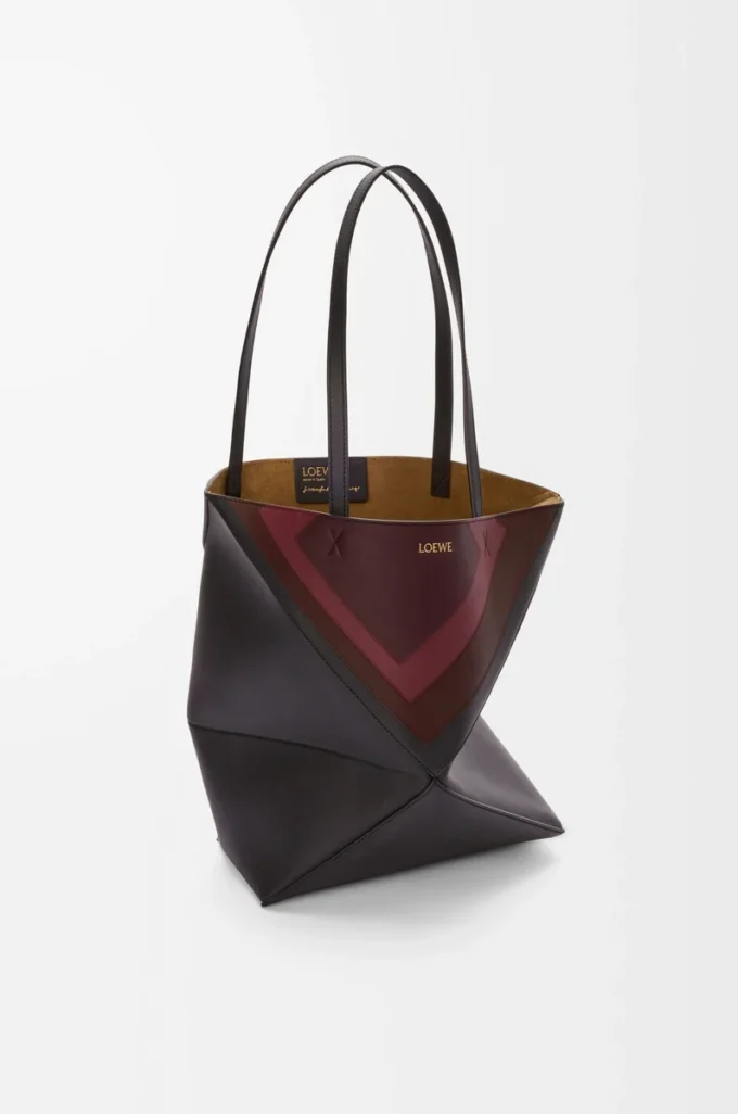 Medium Puzzle Fold tote in nappa calfskin Black/Burgundy