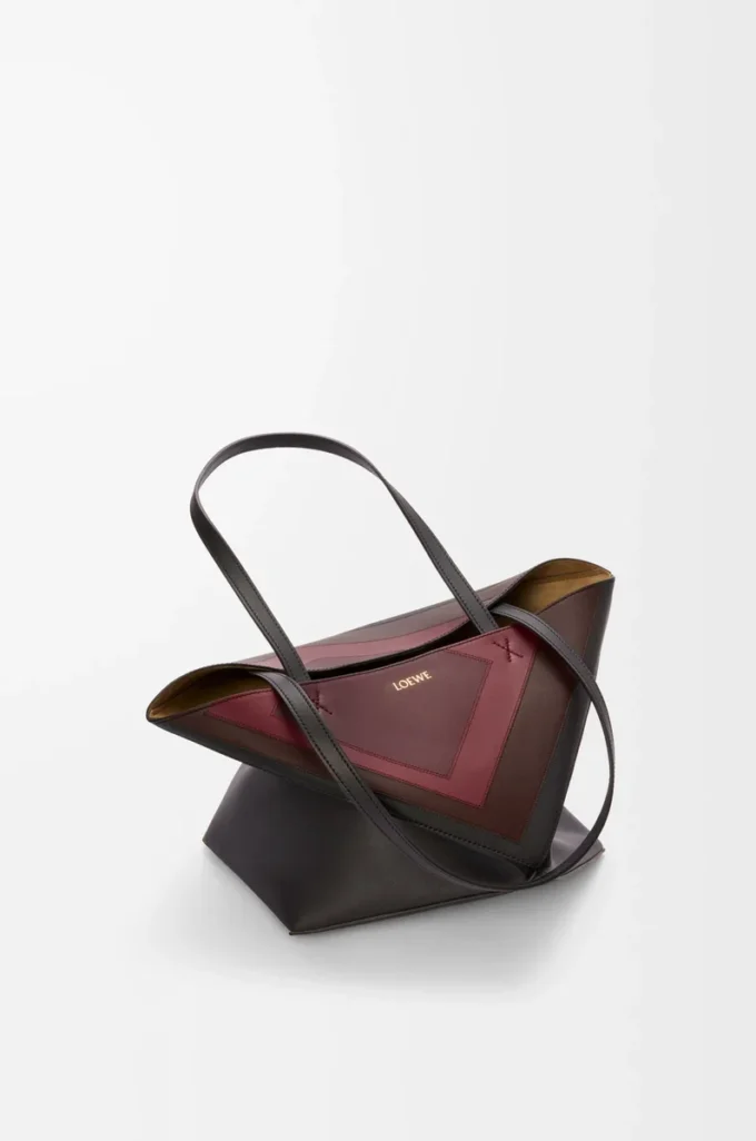Medium Puzzle Fold tote in nappa calfskin Black/Burgundy