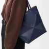 Medium Puzzle Fold tote in shiny calfskin Abyss Blue