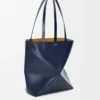 Medium Puzzle Fold tote in shiny calfskin Abyss Blue