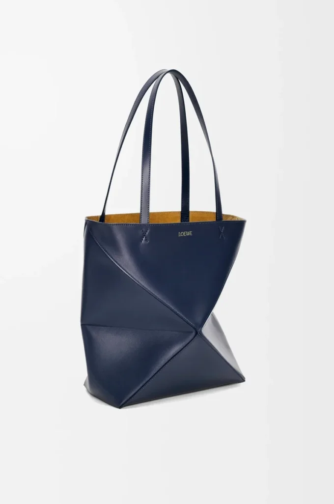 Medium Puzzle Fold tote in shiny calfskin Abyss Blue