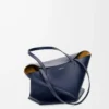 Medium Puzzle Fold tote in shiny calfskin Abyss Blue