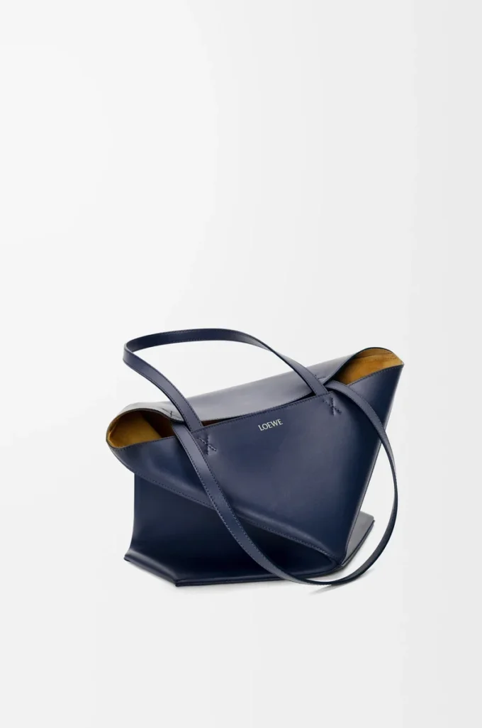 Medium Puzzle Fold tote in shiny calfskin Abyss Blue