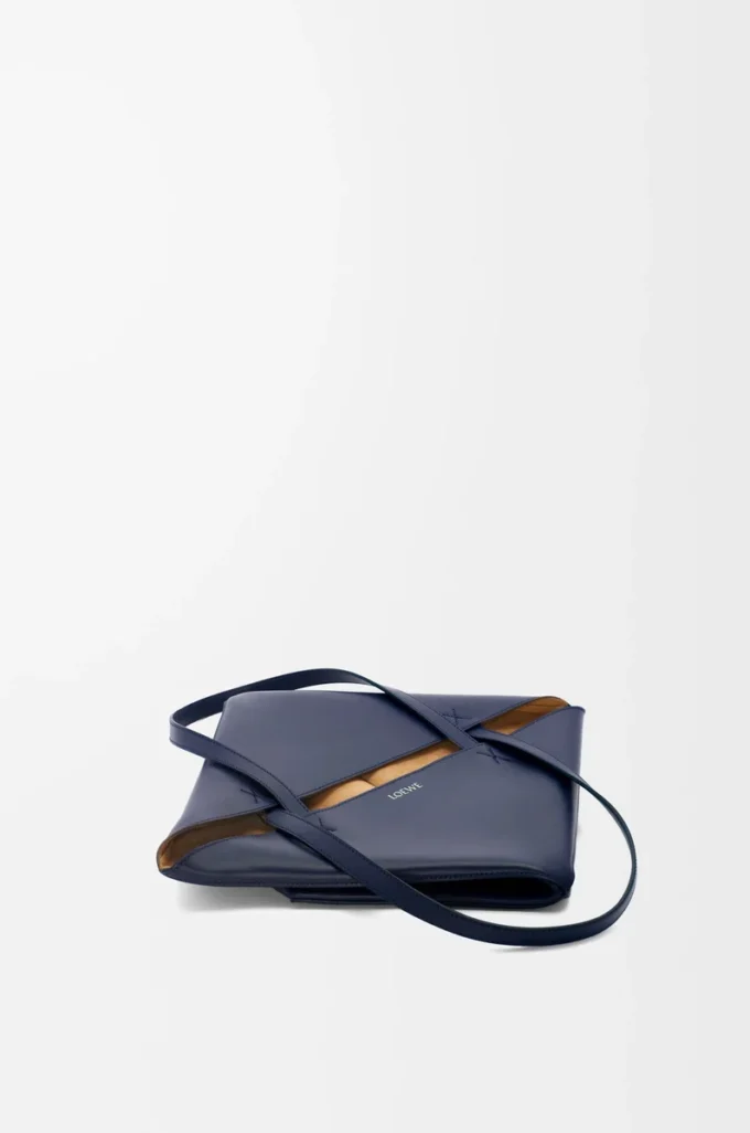 Medium Puzzle Fold tote in shiny calfskin Abyss Blue