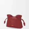 Mini Flamenco clutch in nappa calfskin Burnt Red