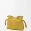 Mini Flamenco clutch in nappa calfskin Ginger