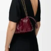 Mini Flamenco purse in eel Burgundy