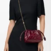 Mini Flamenco purse in eel Burgundy