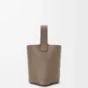 Mini Pebble bucket in soft grained calfskin Taupe