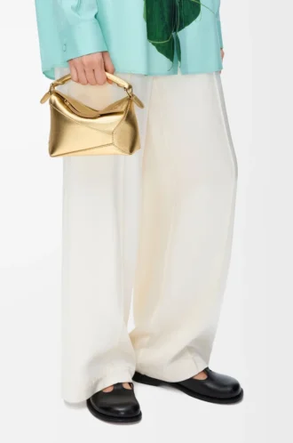 Mini Puzzle Edge bag in laminated lambskin Gold