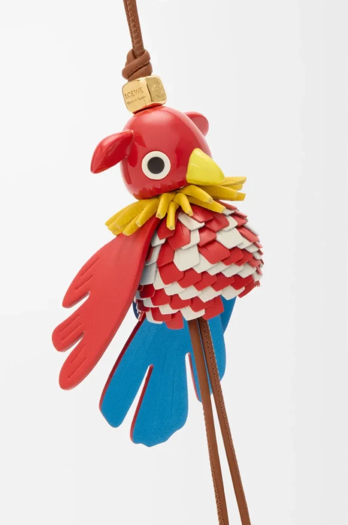 Parrot Puzz charm Tan/Red Parrot Puzz charm Tan/Red