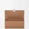 Pebble continental wallet in mini grain calfskin Mocha
