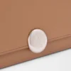 Pebble continental wallet in mini grain calfskin Mocha
