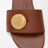 Pebble slide in soft calfskin Rust