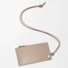 Pebble Slider coin cardholder in shiny nappa calfskin Sand/Tropical Green