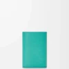 Pebble small vertical wallet in pebble grained calfskin Aquamarine