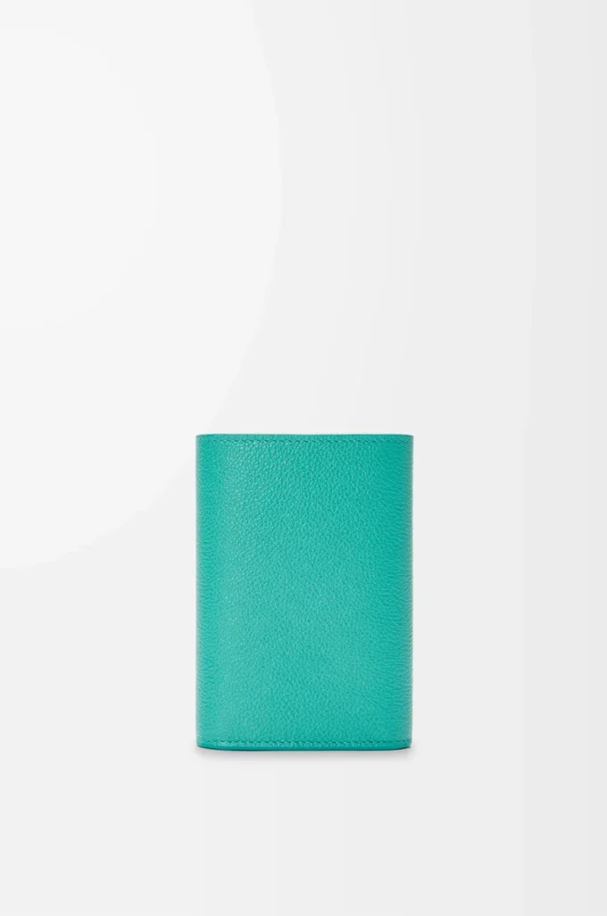Pebble small vertical wallet in pebble grained calfskin Aquamarine