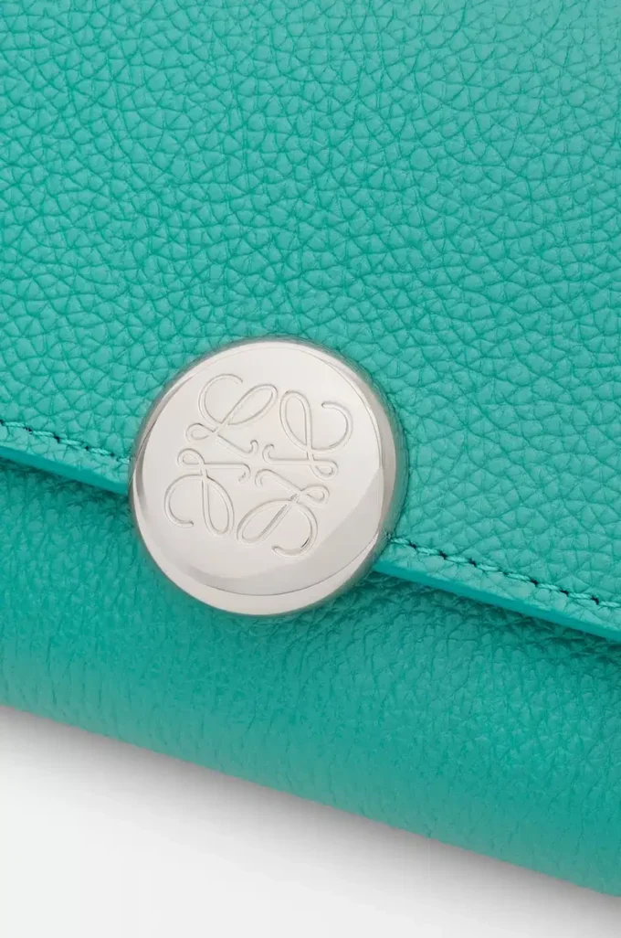 Pebble small vertical wallet in pebble grained calfskin Aquamarine