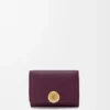 Pebble trifold wallet in pebble grain calfskin Plum