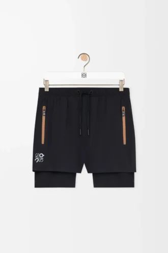 Performance shorts in technical shell Black