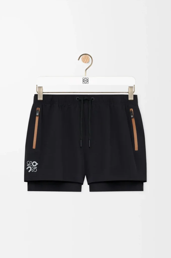 Performance shorts in technical shell Black