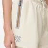 Performance shorts in technical shell Ivory