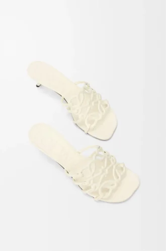 Petal Anagram slide in soft calfskin Anthurium White