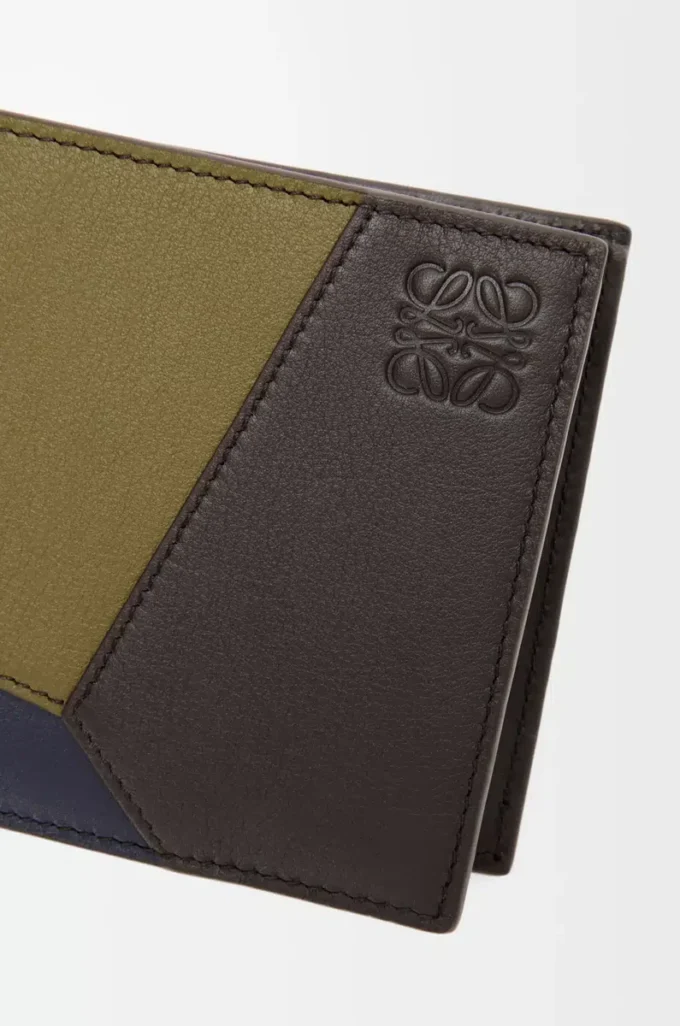 Puzzle bifold coin wallet in classic calfskin Olive/Dark Brown Puzzle bifold coin wallet in classic calfskin Olive/Dark Brown