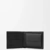 Puzzle bifold coin wallet in supple grained calfskin Black