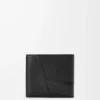 Puzzle bifold coin wallet in supple grained calfskin Black
