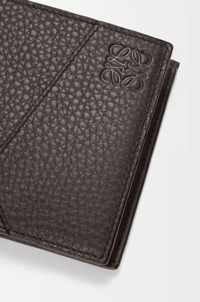 Puzzle bifold coin wallet in supple grained calfskin Dark Grey Puzzle bifold coin wallet in supple grained calfskin Dark Grey