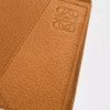 Puzzle bifold coin wallet in supple grained calfskin Light Canyon Brown