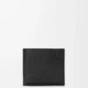Puzzle bifold wallet in supple grained calfskin Black