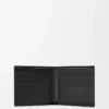 Puzzle bifold wallet in supple grained calfskin Black