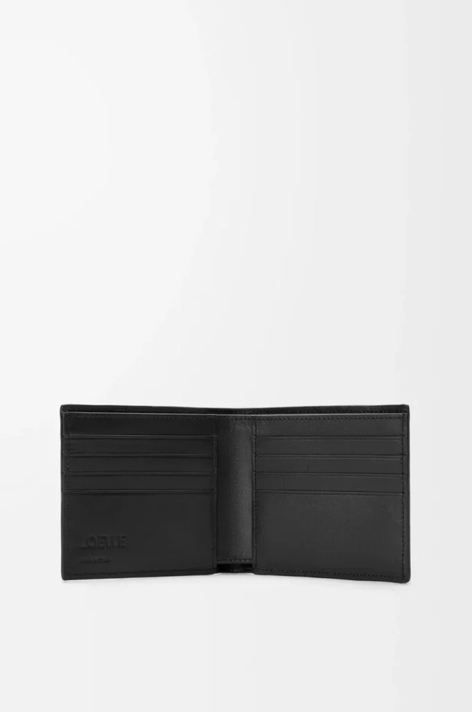 Puzzle bifold wallet in supple grained calfskin Black