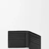 Puzzle bifold wallet in supple grained calfskin Black