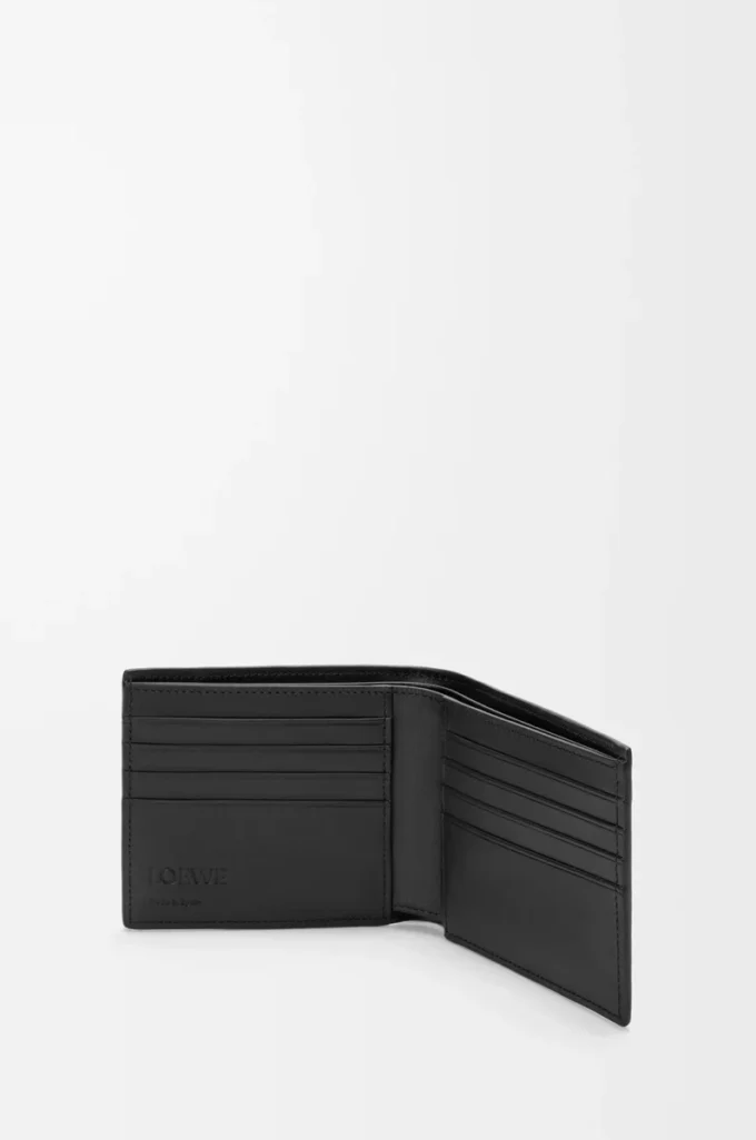 Puzzle bifold wallet in supple grained calfskin Black