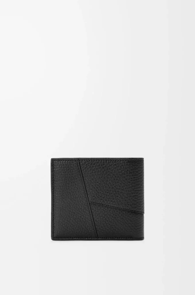 Puzzle bifold wallet in supple grained calfskin Black