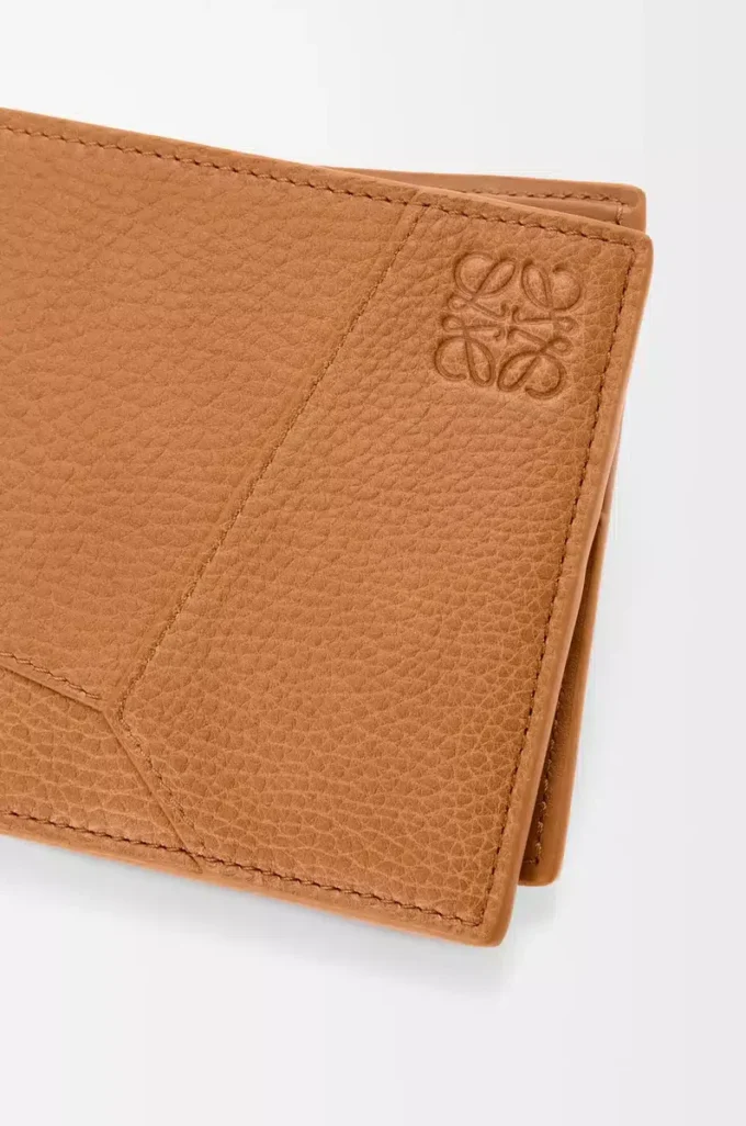 Puzzle bifold wallet in supple grained calfskin Light Canyon Brown