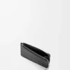 Puzzle coin cardholder in supple grained calfskin Black