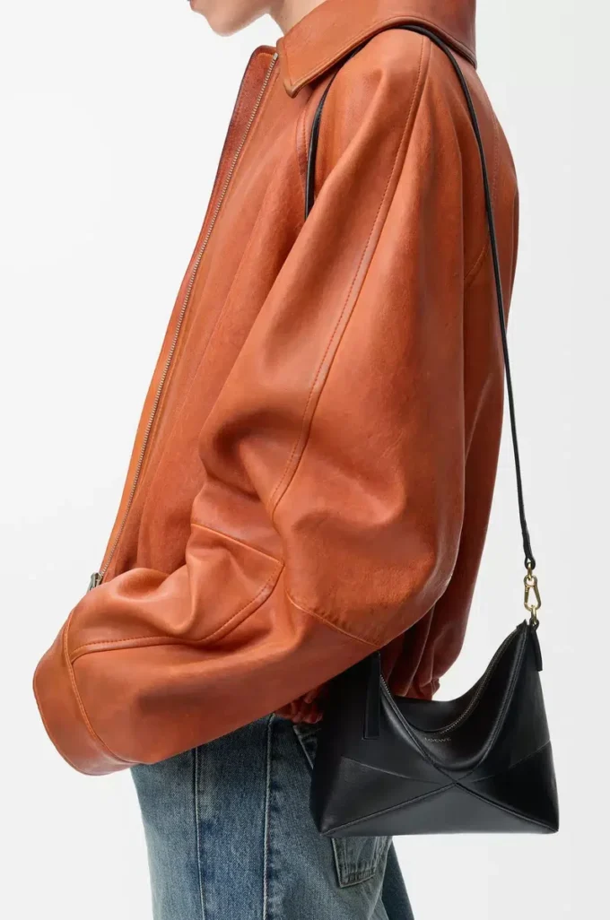 Puzzle Fold pouch in shiny nappa calfskin Black
